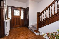 Regal entryway with leaded glass windows - 