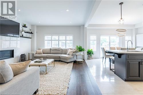 28 Columbus Gate, Stoney Creek, ON - Indoor Photo Showing Living Room With Fireplace