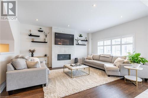 28 Columbus Gate, Stoney Creek, ON - Indoor Photo Showing Living Room With Fireplace