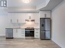 818 - 3220 William Coltson Avenue, Oakville, ON  - Indoor Photo Showing Kitchen With Stainless Steel Kitchen 