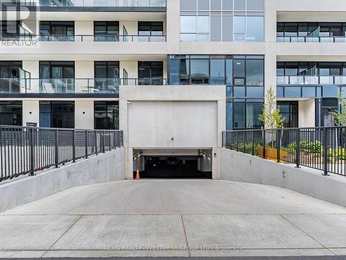 818 - 3220 William Coltson Avenue, Oakville, ON - Outdoor With Balcony With Facade