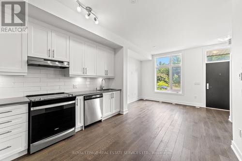 L113 - 9560 Islington Avenue, Vaughan, ON - Indoor Photo Showing Kitchen With Stainless Steel Kitchen With Upgraded Kitchen