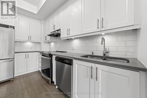 L113 - 9560 Islington Avenue, Vaughan, ON - Indoor Photo Showing Kitchen With Stainless Steel Kitchen With Double Sink With Upgraded Kitchen