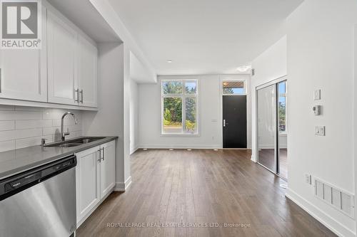 L113 - 9560 Islington Avenue, Vaughan, ON - Indoor Photo Showing Kitchen With Double Sink