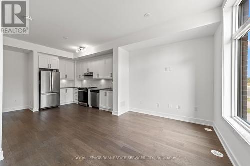 L113 - 9560 Islington Avenue, Vaughan (Sonoma Heights), ON - Indoor Photo Showing Kitchen With Stainless Steel Kitchen