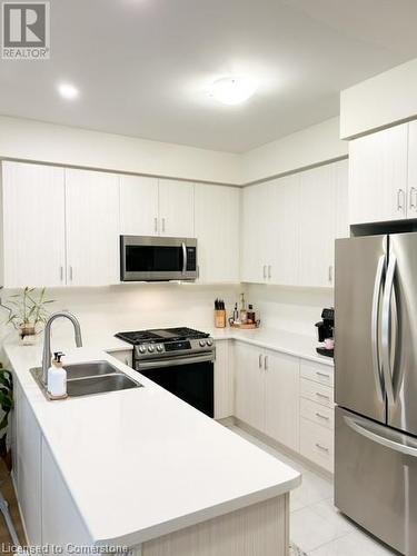 70 Genoa Drive, Hamilton, ON - Indoor Photo Showing Kitchen With Double Sink With Upgraded Kitchen