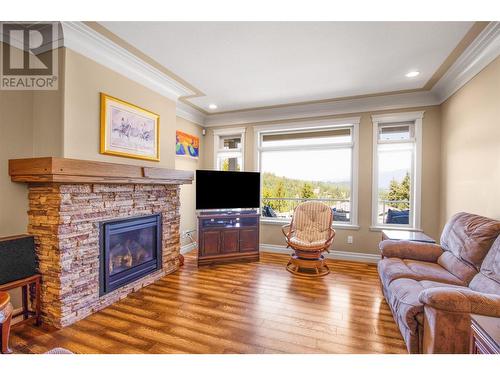 2592 Alpen Paradies Road Unit# 7, Blind Bay, BC - Indoor Photo Showing Living Room With Fireplace