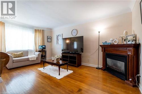 204 Parkdale Avenue S, Hamilton, ON - Indoor Photo Showing Living Room With Fireplace