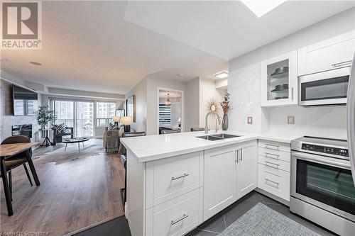 25 Kingsbridge Garden Circle Unit# 1021, Mississauga, ON - Indoor Photo Showing Kitchen With Double Sink