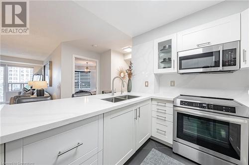 25 Kingsbridge Garden Circle Unit# 1021, Mississauga, ON - Indoor Photo Showing Kitchen With Double Sink With Upgraded Kitchen