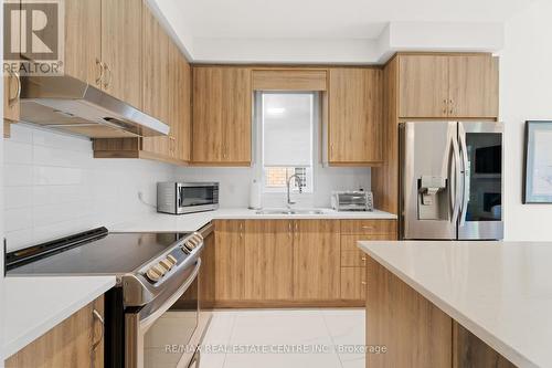 21 Overlea Drive, Brampton, ON - Indoor Photo Showing Kitchen With Double Sink