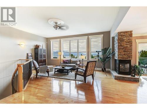 313 Tanager Drive, Kelowna, BC - Indoor Photo Showing Living Room With Fireplace