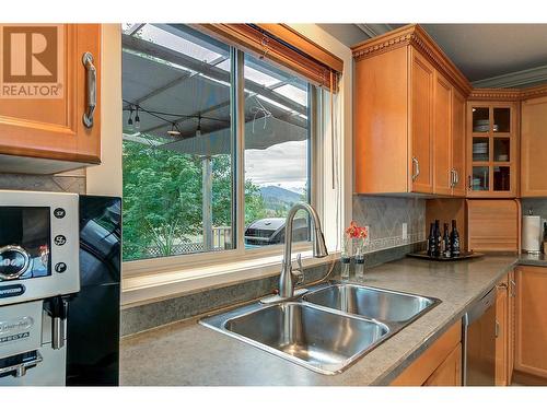 313 Tanager Drive, Kelowna, BC - Indoor Photo Showing Kitchen With Double Sink