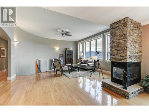 313 Tanager Drive, Kelowna, BC - Indoor Photo Showing Living Room With Fireplace