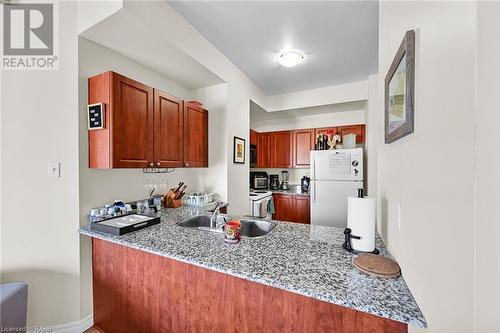 135 James Street S Unit# 915, Hamilton, ON - Indoor Photo Showing Kitchen With Double Sink