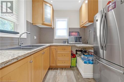 1617 Main Street E, Hamilton, ON - Indoor Photo Showing Kitchen With Double Sink