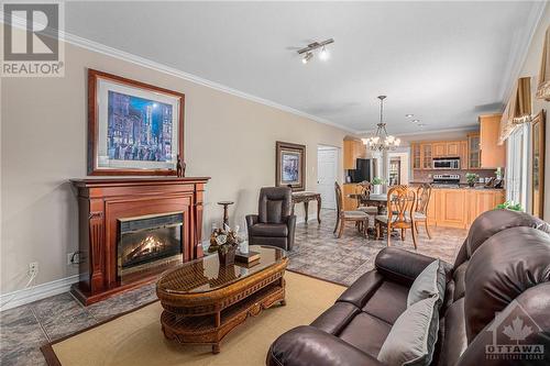 8 Du Boise Street, Embrun, ON - Indoor Photo Showing Living Room With Fireplace