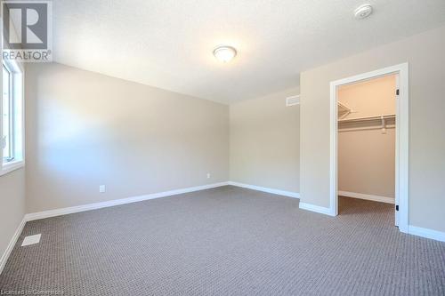 Master Bedroom with Walk In Closet - 423 Woolwich Street, Waterloo, ON - Indoor Photo Showing Other Room