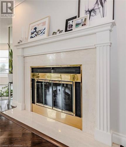 Fireplace in Great Room - 2220 Lakeshore Road Unit# 36, Burlington, ON - Indoor Photo Showing Other Room With Fireplace