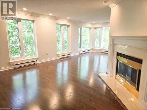 2220 Lakeshore Road Unit# 36, Burlington, ON - Indoor Photo Showing Other Room With Fireplace