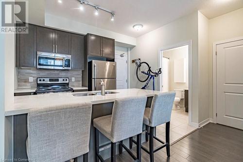 85 Robinson Street Unit# 908, Hamilton, ON - Indoor Photo Showing Kitchen With Double Sink