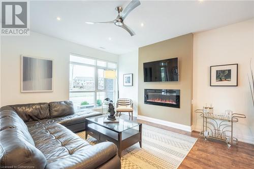 4 Concord Place, Grimsby, ON - Indoor Photo Showing Living Room With Fireplace