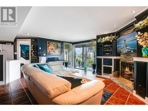 240 Clifton Road N, Kelowna, BC - Indoor Photo Showing Living Room With Fireplace