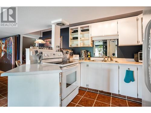 240 Clifton Road N, Kelowna, BC - Indoor Photo Showing Kitchen With Double Sink