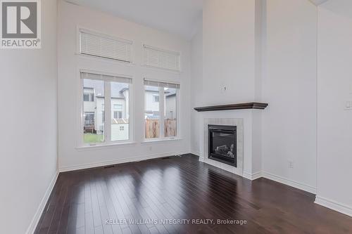 660 Capricorn Circle, Ottawa, ON - Indoor Photo Showing Living Room With Fireplace