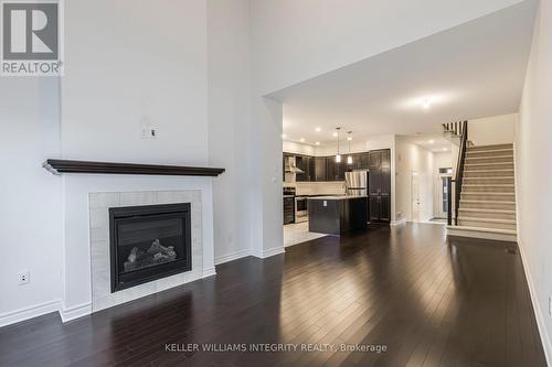 660 Capricorn Circle, Ottawa, ON - Indoor Photo Showing Living Room With Fireplace