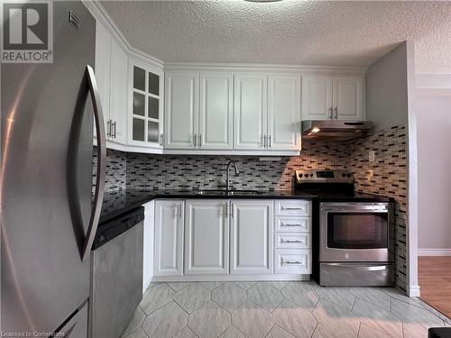 355 Rathburn Road E Unit# 608, Mississauga, ON - Indoor Photo Showing Kitchen With Double Sink