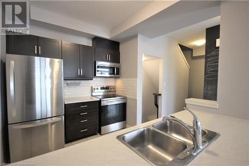 201 Westbank Trail Unit# 23, Hamilton, ON - Indoor Photo Showing Kitchen With Double Sink