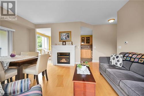 2000 Creekside Drive Unit# 305, Dundas, ON - Indoor With Fireplace