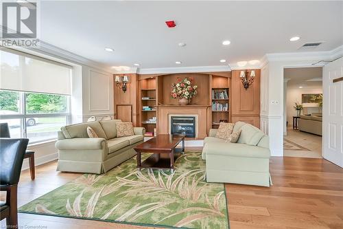 2000 Creekside Drive Unit# 305, Dundas, ON - Indoor Photo Showing Living Room With Fireplace