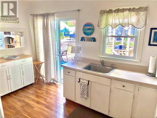 Access to the side deck and BBQ. - 322 Oxford Avenue, Crystal Beach, ON - Indoor Photo Showing Kitchen