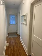 Back door and hallway, new bedroom doors. - 