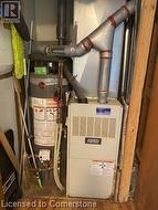 Utility room. Forced air gas furnance and brand new water tank! - 