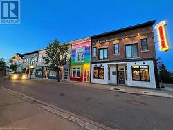 Shops at dusk. - 