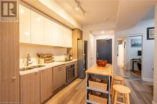 5230 Dundas Street Unit# A428, Burlington, ON - Indoor Photo Showing Kitchen With Double Sink