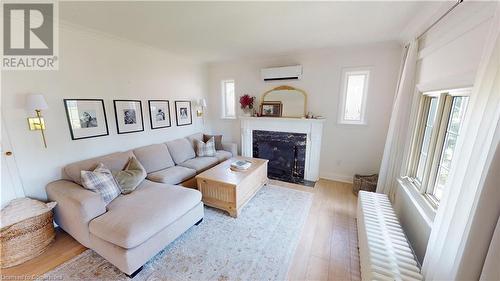 Living Room - 5953 Carlton Avenue, Niagara Falls, ON - Indoor Photo Showing Living Room With Fireplace