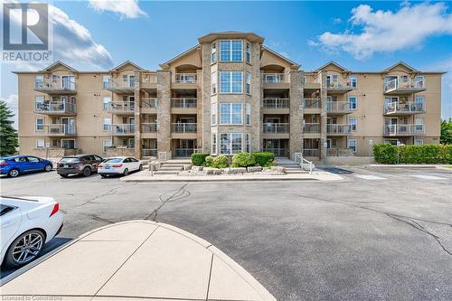 1800 Walkers Line Unit# 310, Burlington, ON - Outdoor With Balcony With Facade