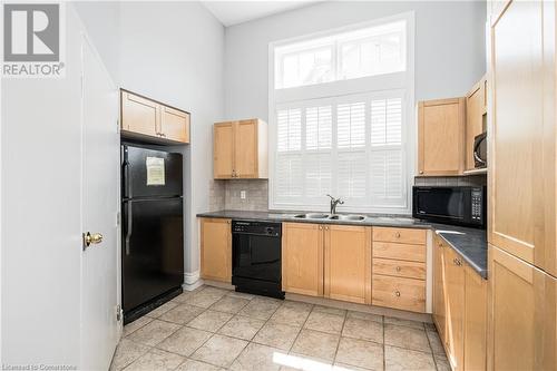 1800 Walkers Line Unit# 310, Burlington, ON - Indoor Photo Showing Kitchen With Double Sink