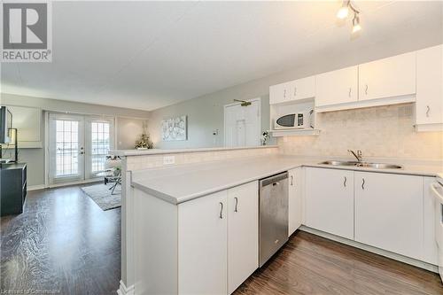 1800 Walkers Line Unit# 310, Burlington, ON - Indoor Photo Showing Kitchen With Double Sink