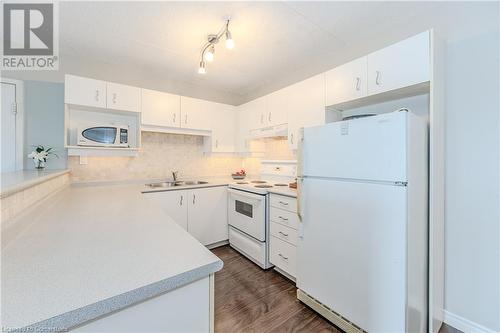 1800 Walkers Line Unit# 310, Burlington, ON - Indoor Photo Showing Kitchen With Double Sink