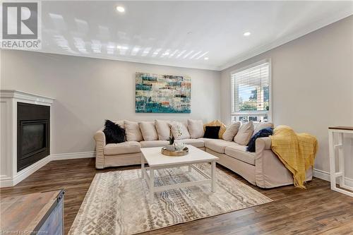 82 East 35Th Street, Hamilton, ON - Indoor Photo Showing Living Room With Fireplace