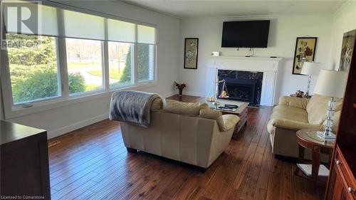 Double wide driveway - 15414 Niagara River Parkway, Niagara-On-The-Lake, ON - Indoor Photo Showing Living Room With Fireplace