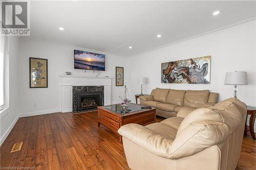 Living room with gas fireplace - 15414 Niagara River Parkway, Niagara-On-The-Lake, ON - Indoor Photo Showing Living Room With Fireplace