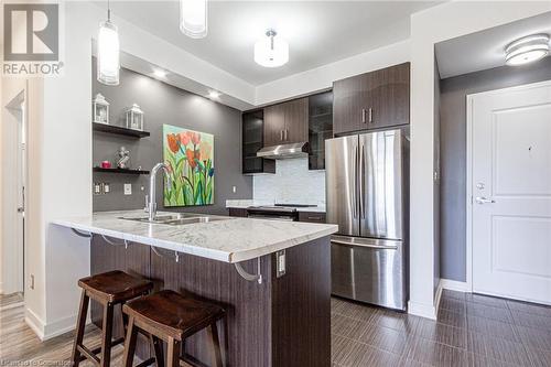 5317 Upper Middle Road Unit# 127, Burlington, ON - Indoor Photo Showing Kitchen With Double Sink With Upgraded Kitchen