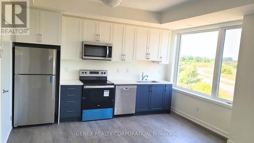 103 - 160 Densmore Road, Cobourg, ON - Indoor Photo Showing Kitchen With Stainless Steel Kitchen