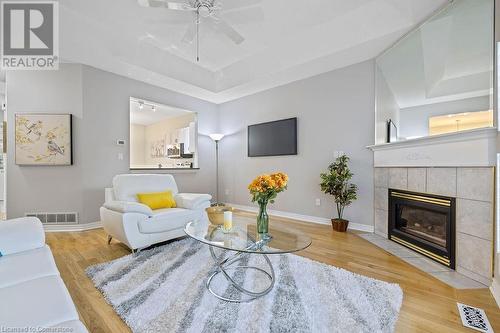 95 Starfish Drive, Mount Hope, ON - Indoor Photo Showing Living Room With Fireplace